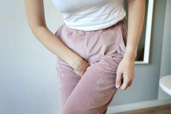older woman running to the toilet because of urinary incontinence Cockfosters