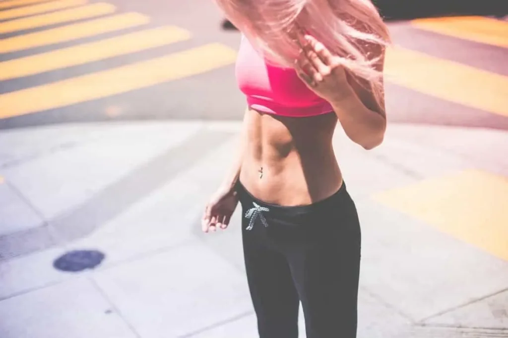 Woman with toned stomach after LA-EMS Body Sculpting Treatment Cockfosters